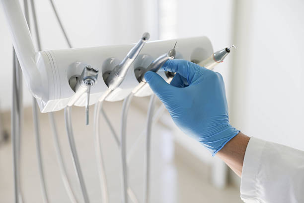 Professional Tooth Extraction technician working in Lillington, NC